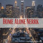 Kevin McCallister smiling in front of the Rockefeller Center Christmas tree in New York City.