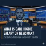 A professional headshot of Carl Higbie in a studio setting, looking at the camera.