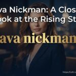  A professional and friendly headshot of Ava Nickman smiling, set against a neutral, modern background.