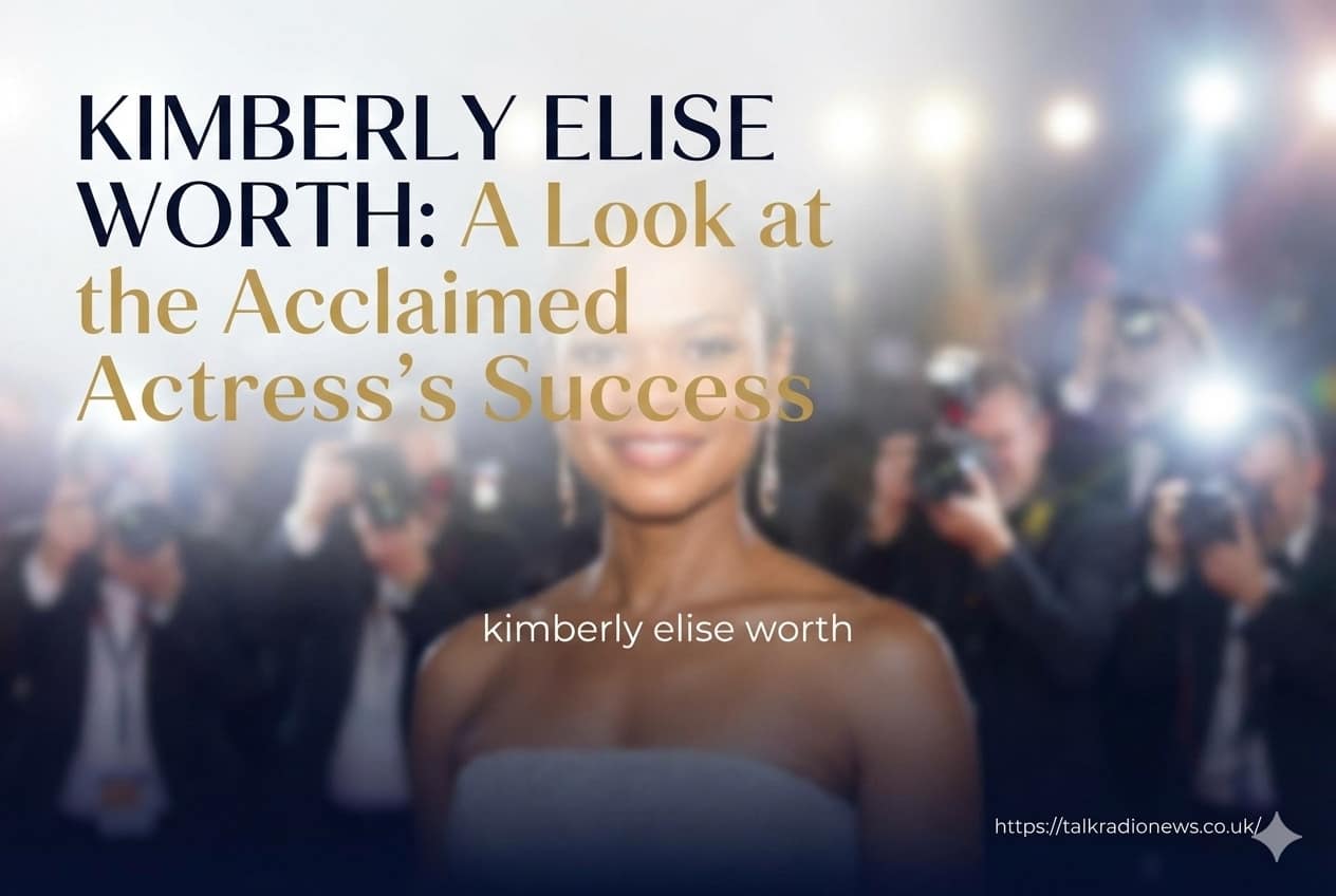 Actress Kimberly Elise smiling at a red carpet event.