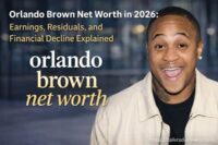 Orlando Brown at a red carpet event, highlighting his Disney Channel fame, career journey, and 2026 net worth.