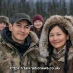 Ricko DeWilde and his partner Rona Vent with their children in the Alaskan wilderness, showcasing their family life and traditional subsistence lifestyle.