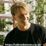 Chris Briney standing at 6 feet 1 inch, known for his role as Conrad Fisher