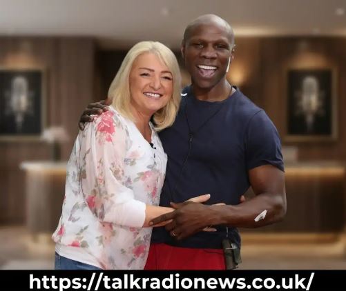 Claire Geary sports broadcaster reporting live from sideline during a game